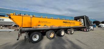 overhead crane on a delivery trailer