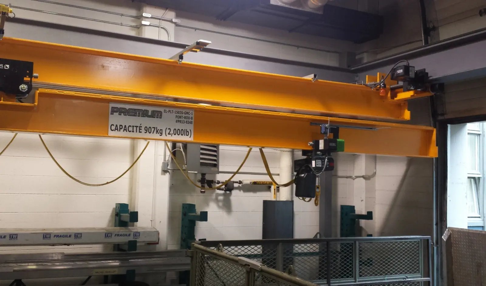 pont-roulant telescopique d'une capacité de 907 kg